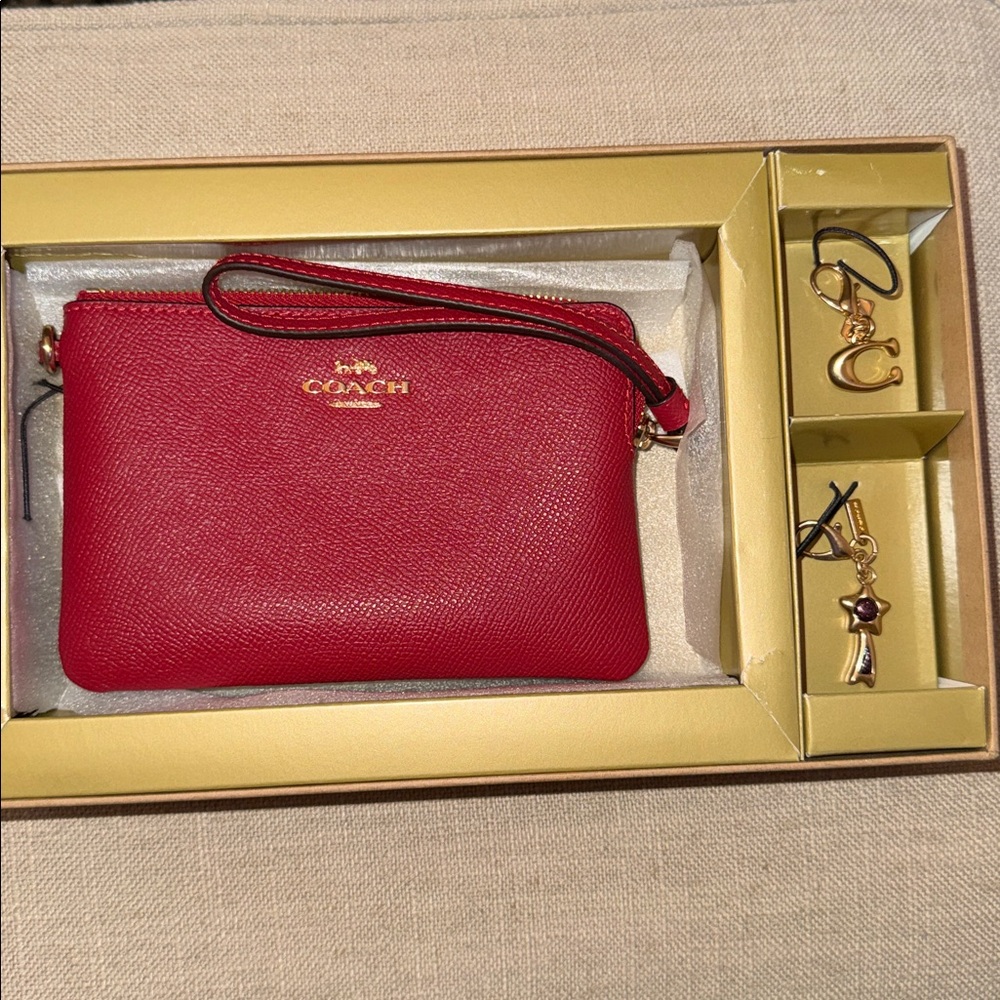 COACH RED WRISTLET WITH CHANGEABLE CHARMS!